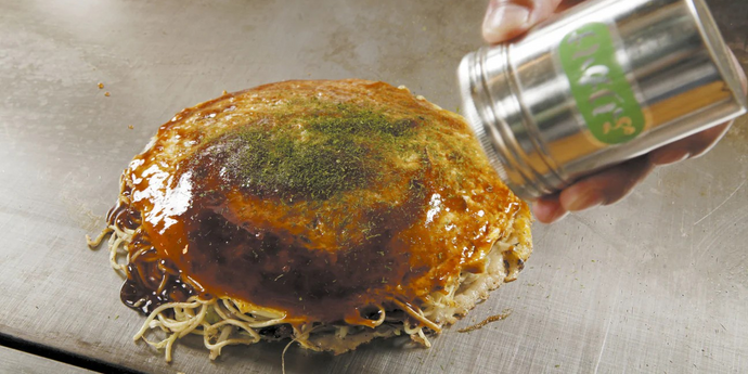 What is the stuff on top of okonomiyaki?