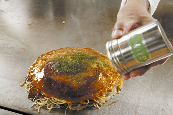 What is the stuff on top of okonomiyaki?